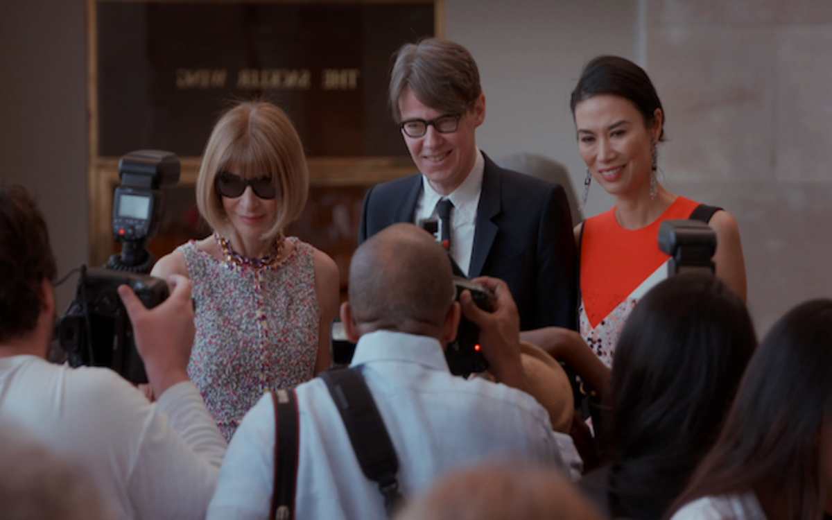 Anna Wintour (L), Andrew Bolton (C), and Wendi Deng Murdoch (R). (Courtesy Image)