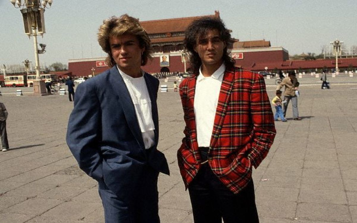 George Michael and Andrew Ridgeley, members of the English group WHAM!, visit the Forbidden City. April 1985 Beijing, China