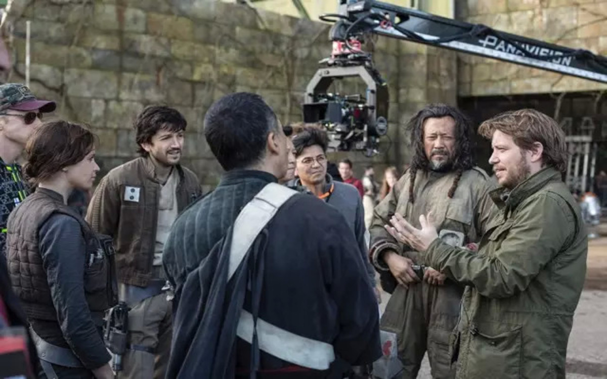 Jiang Wen (second from right) stands with "Rogue One: A Star Wars Story" director Gareth Edwards (right) on set.